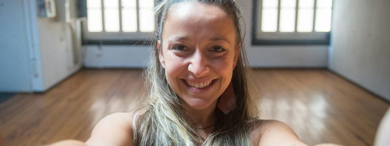 Wide shot of a modern minimalist fitness studio space